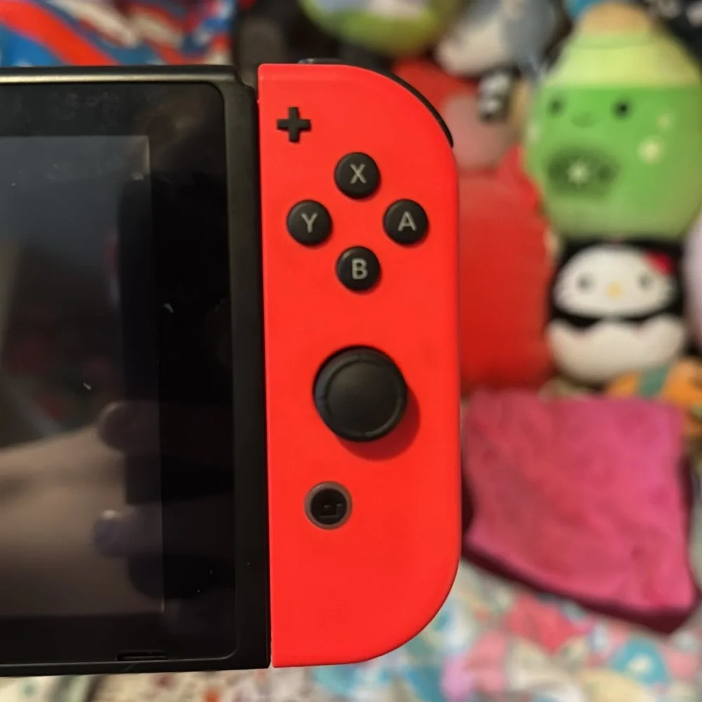 Nintendo switch handheld gaming system like brand new barley ever used